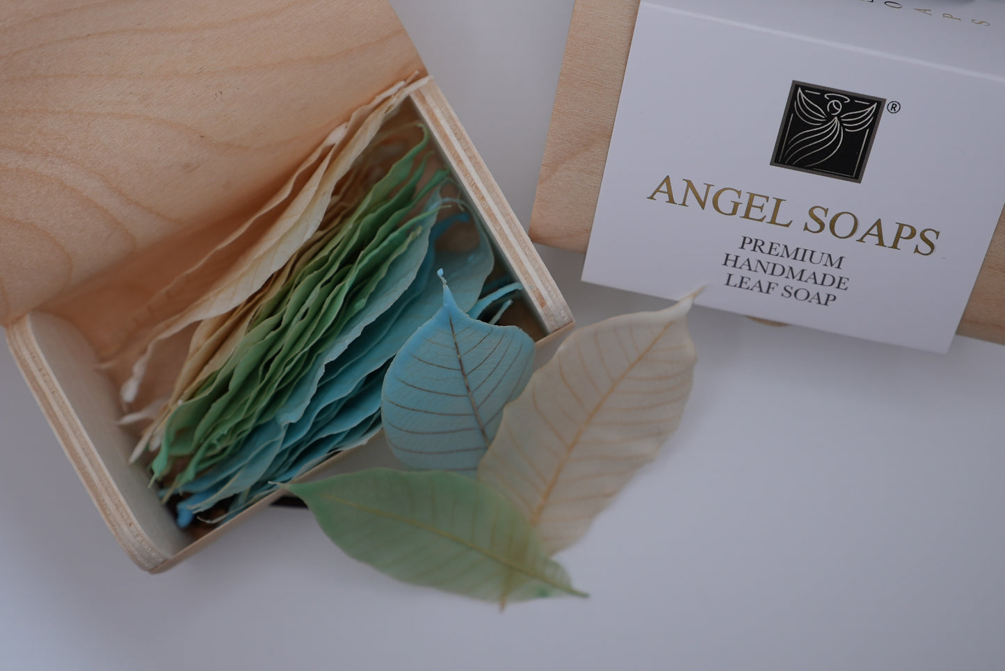 Box of Angel Soaps with leaf-shaped soaps and a branded card