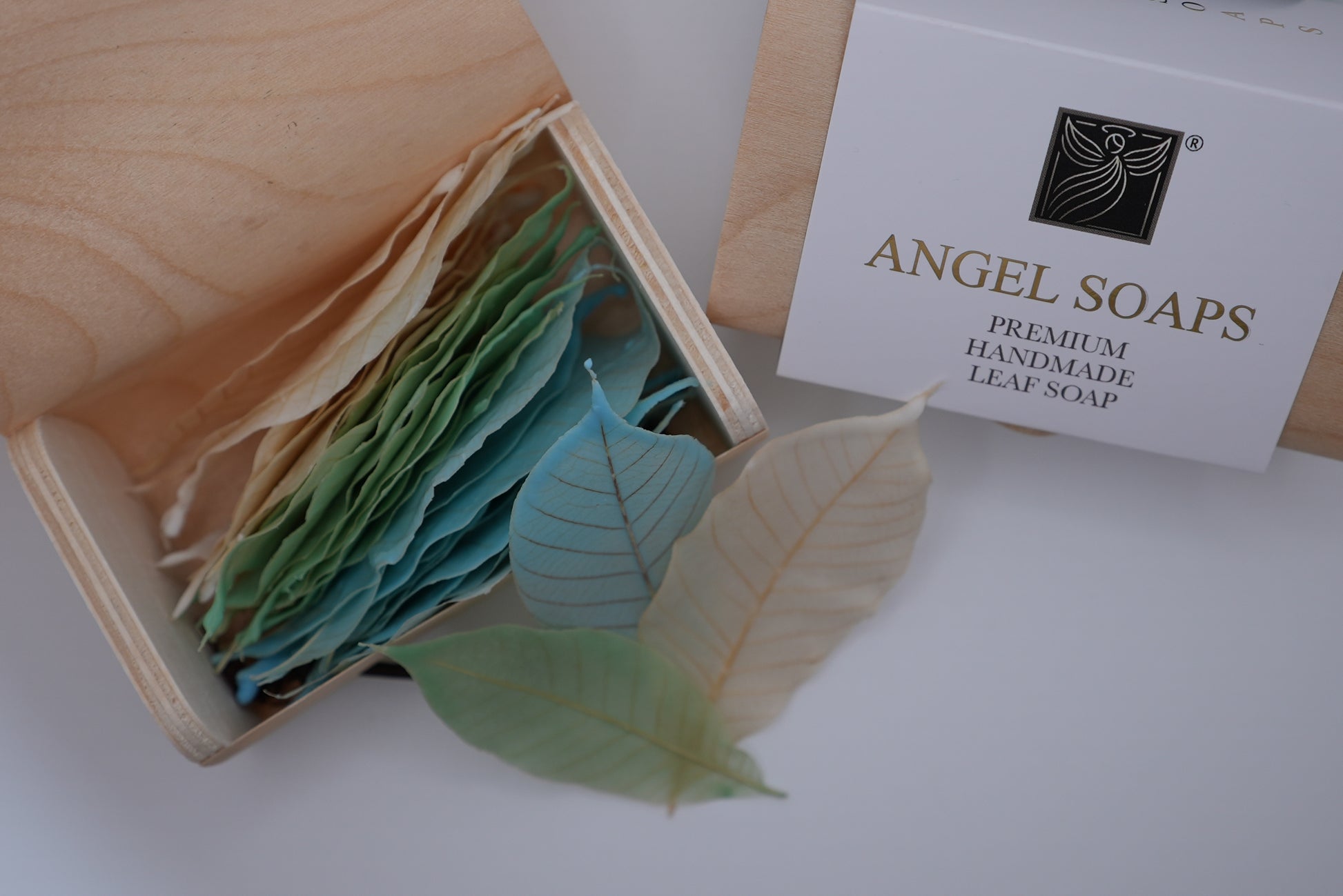 Box of Angel Soaps with leaf-shaped soaps and a branded card 